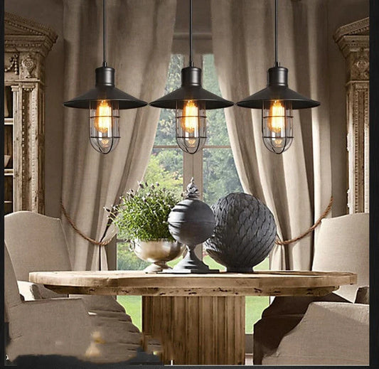 Black iron pendant lamp with cage-style explosion-proof glass shade and adjustable hanging chain