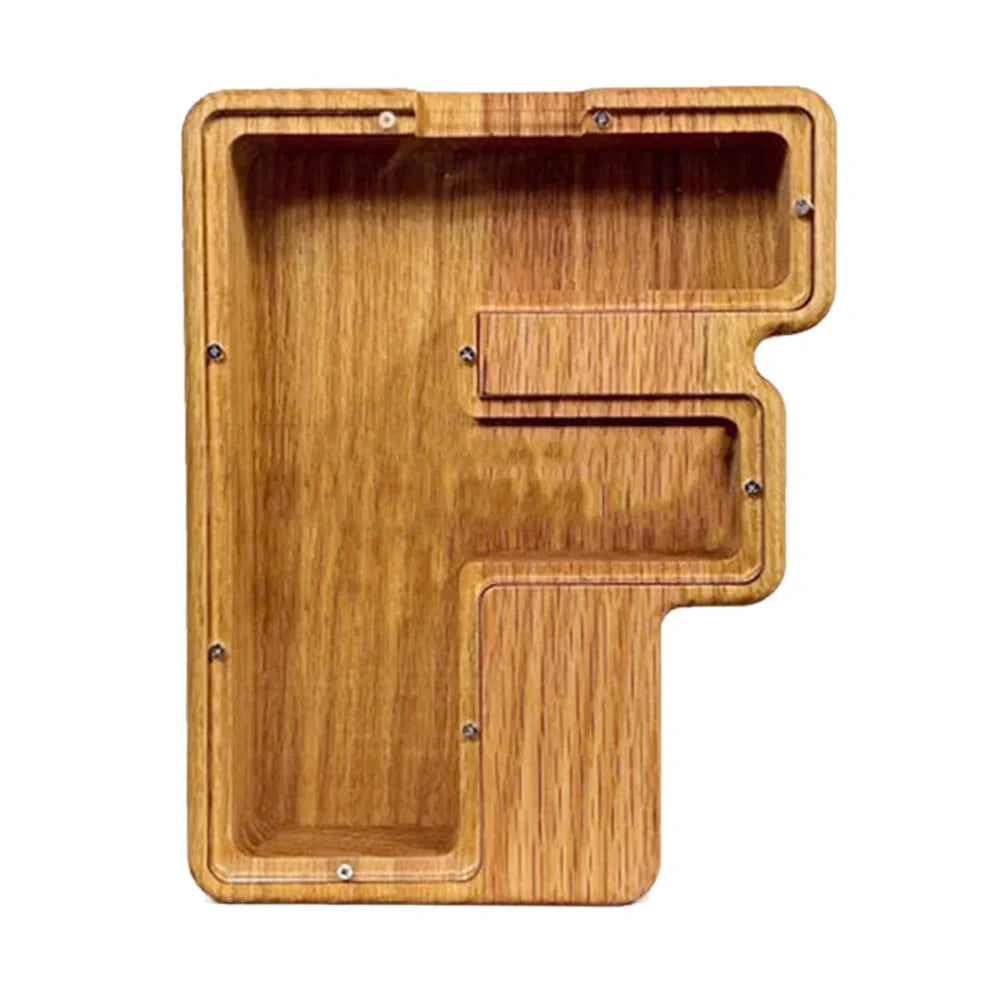 Handmade wooden letter piggy bank with personalised initial, showing 15cm height and 5cm coin slot for UK coins