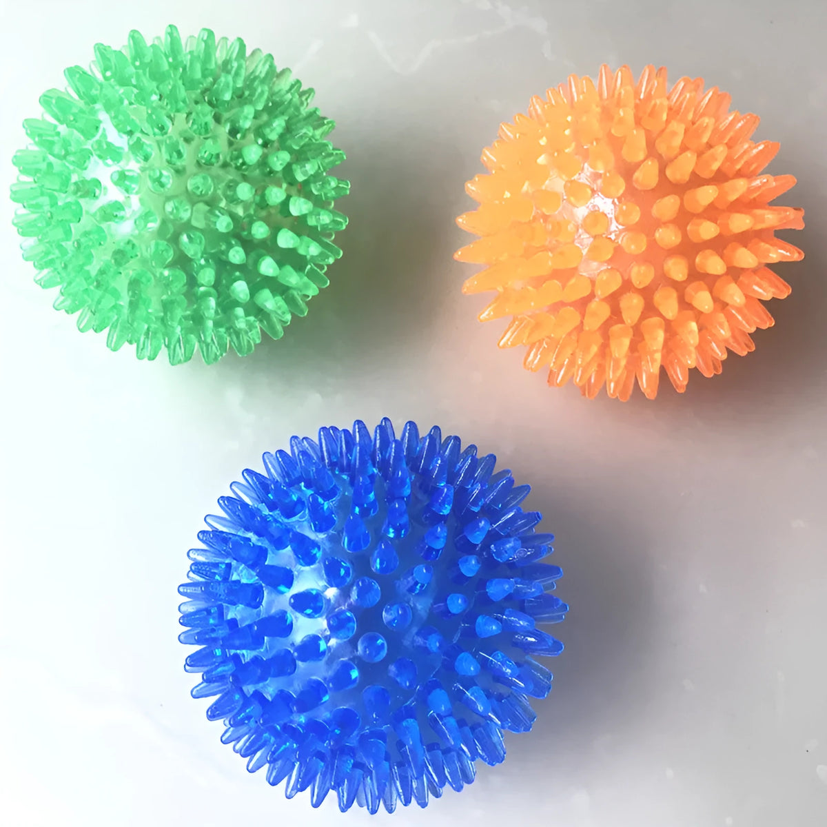 Large dog vocal toy ball in blue TPR, 11cm bouncy sounding ball for fetch play