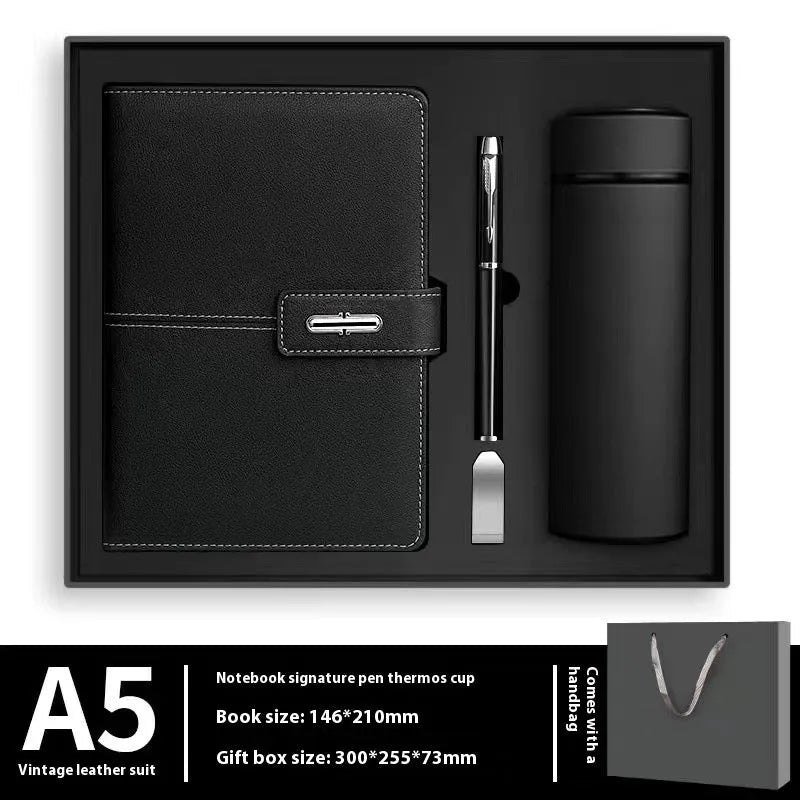 A5 notebook with imitation leather cover in a choice of colours including black, red, green, blue, and orange.