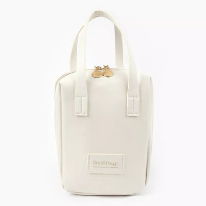 Girly Heart Egg Shell Waterproof Makeup Bag in pink and white with sewing line design