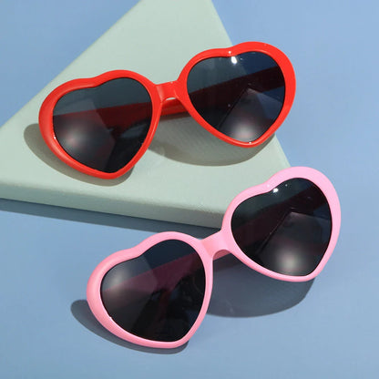 Stylish heart-shaped lighting sunglasses with a plastic frame and resin lenses, creating a mesmerizing effect for romantic occasions