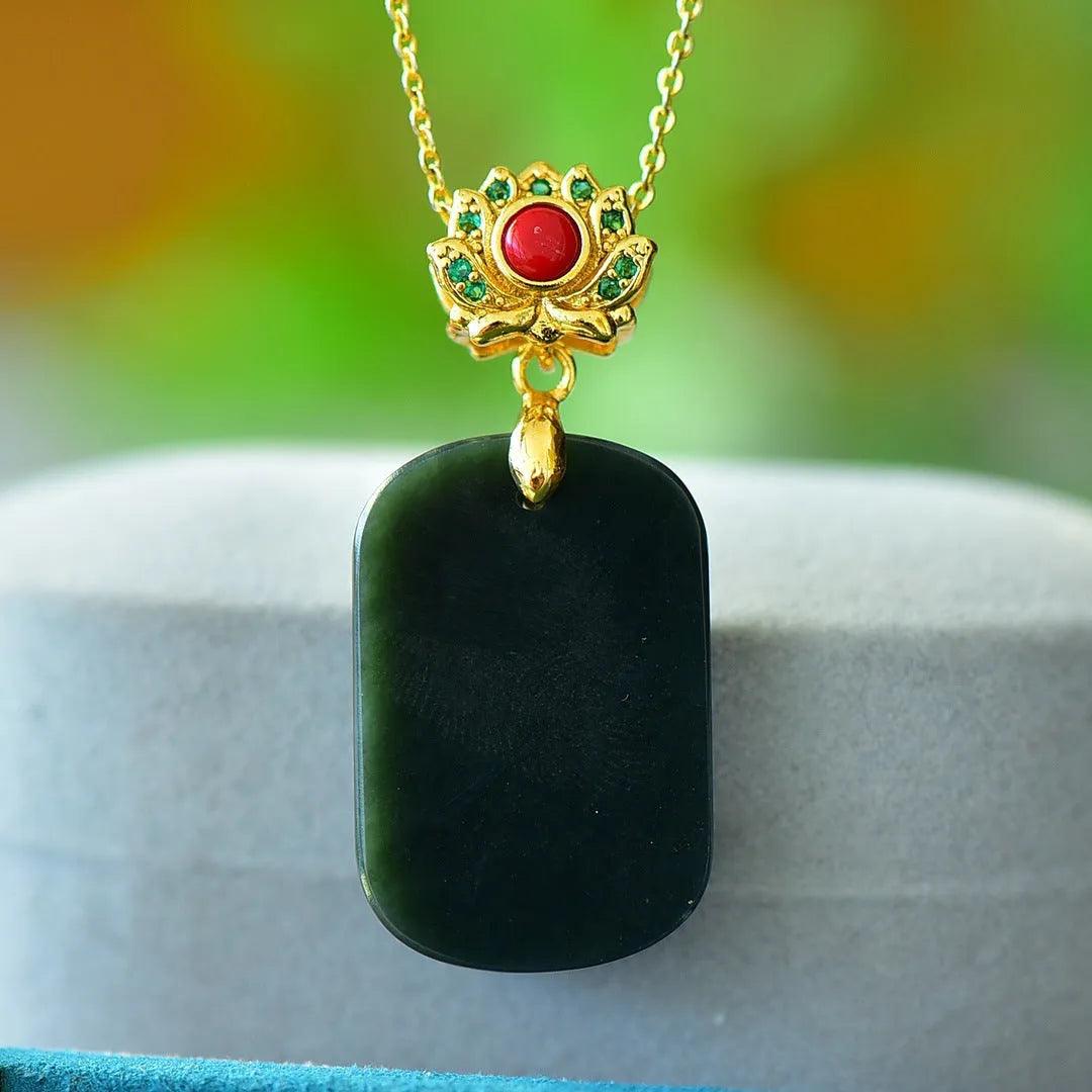 Flat grey Hetian Jade pendant with ink blue jade details and copper inlay on a necklace chain