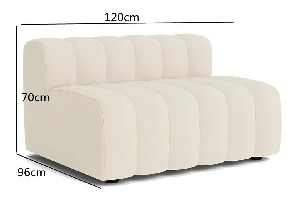 Off-white curved modular sofa with fleece fabric in corner configuration showing multiple connected pieces