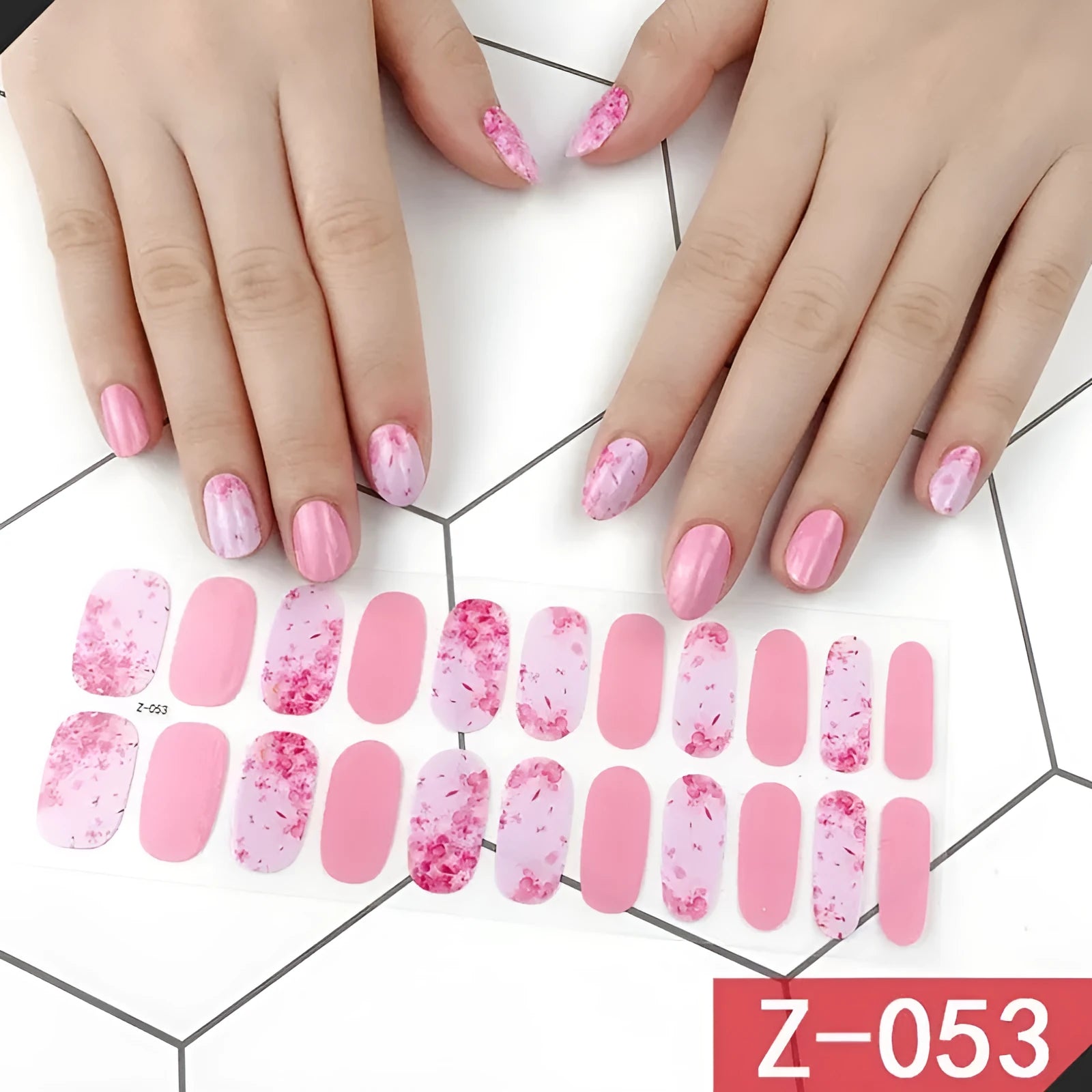 Korean nail stickers sheet showing cartoon, flower, and strawberry patterns with a nail file.