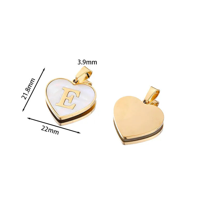 Gold-plated clavicle necklace with a white shell heart pendant, personalised with a letter from A to Z.