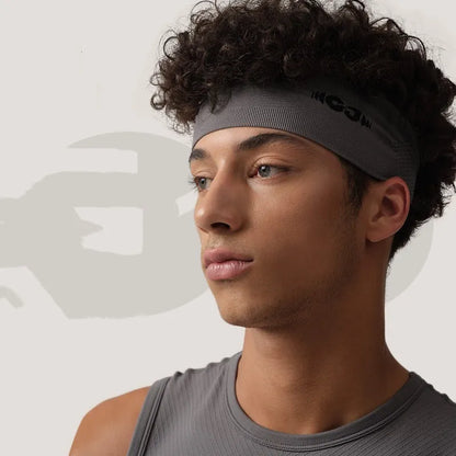 Seamless knitted exercise hair band in black, gray, and blue for sweat management during sports