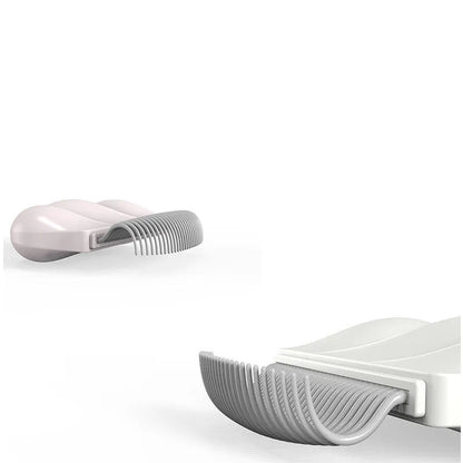 Blue Paw Soft deshedding brush for removing matted fur from cats and dogs on a white background.