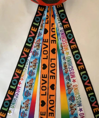 Children's helmet streamer with 60 cm polyester ribbon in colours like apricot and khaki for roller skating and skiing