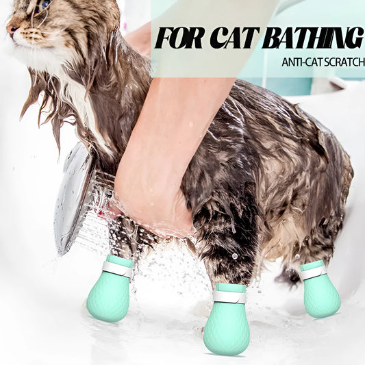Four transparent green silicone cat paw covers for scratch protection during grooming and care
