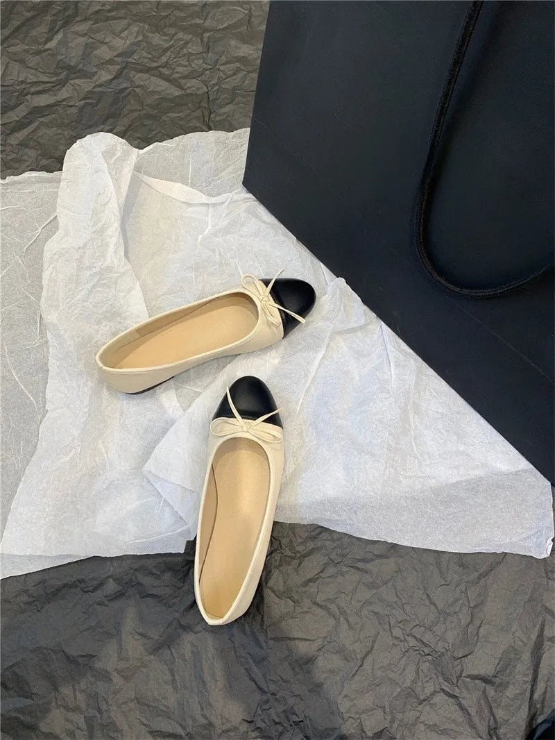 Ballet flat shoes with bowknot decoration and soft rubber soles in apricot colour