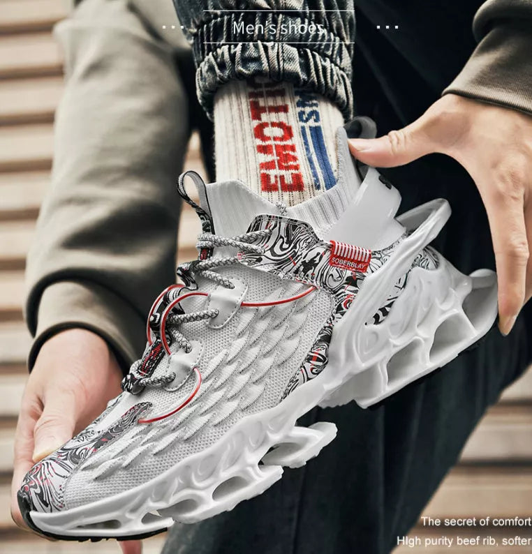 Soft Bottom Blade Running Sneaker in white, apricot, and black with breathable mesh upper and rubber sole