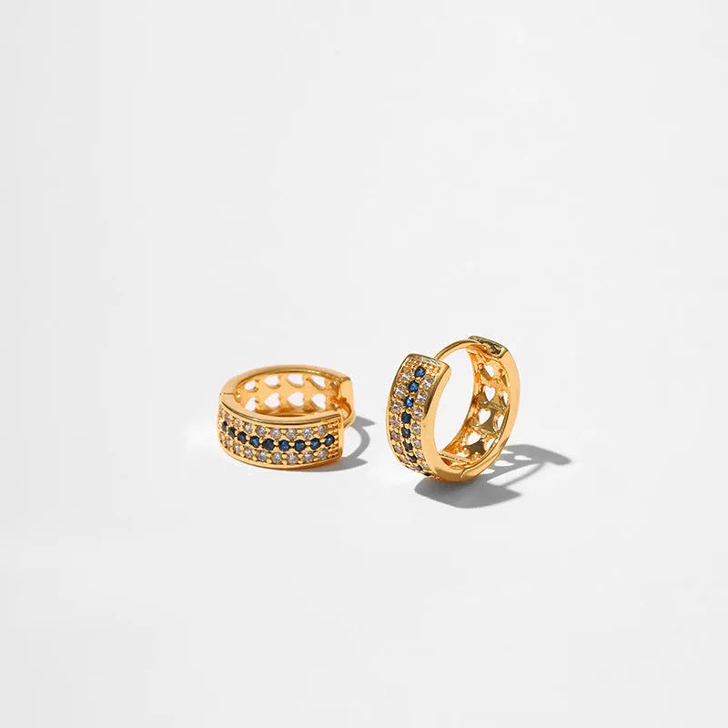 Round geometric women's earrings with 18K gold electroplated finish on copper, secure fastening