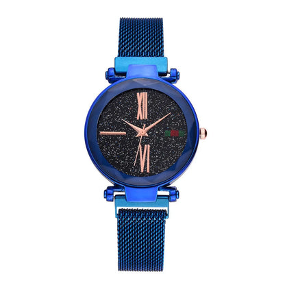 Rose gold ladies watch with round 32mm dial and magnetic stainless steel jewellery clasp on wrist.