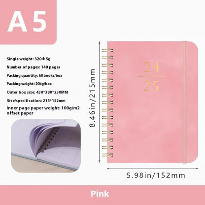 A5 size PU leather notebook with metal coil binding in a choice of colours including black, blue, and brown.