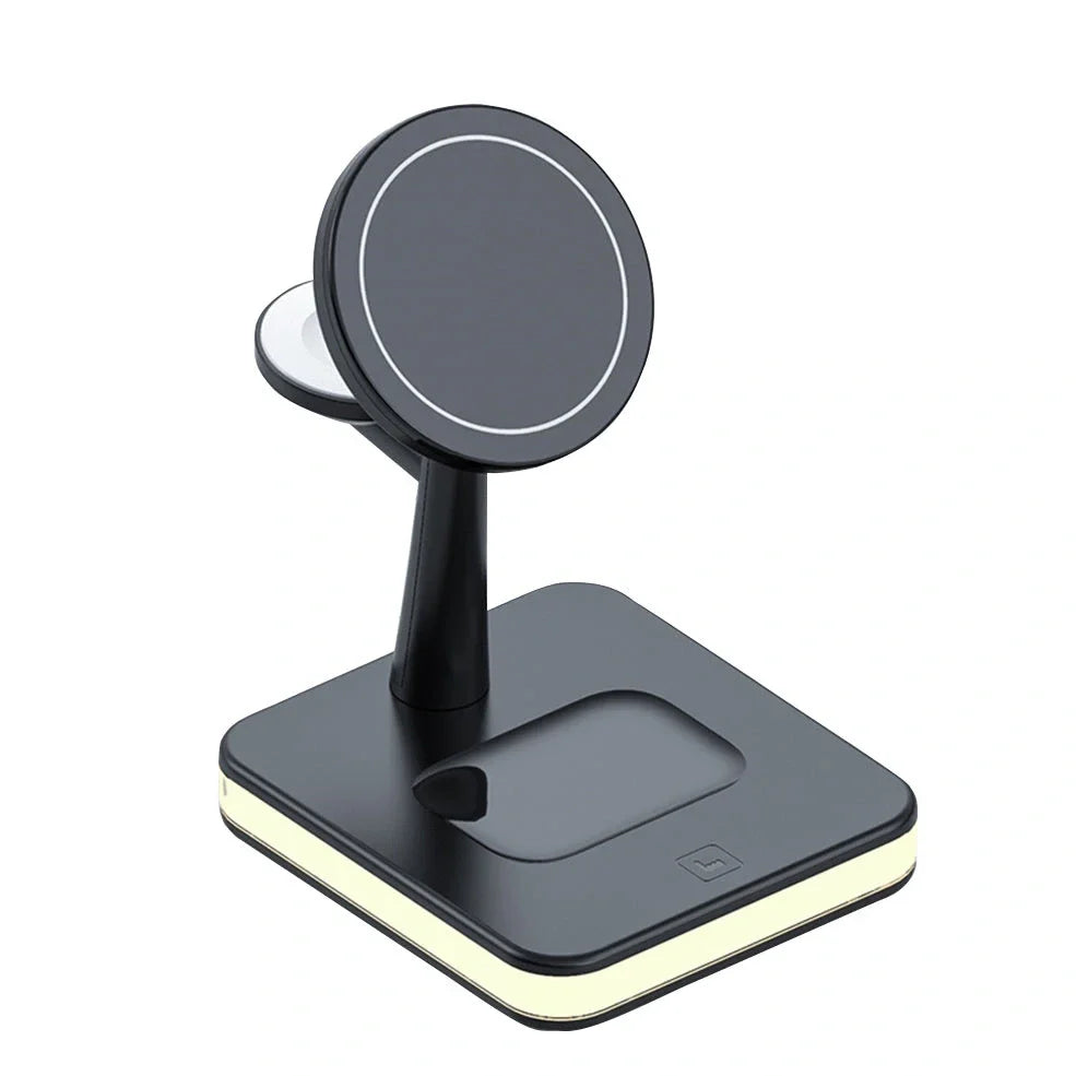 Black three-in-one wireless charger magnetic bracket on a desk charging multiple devices