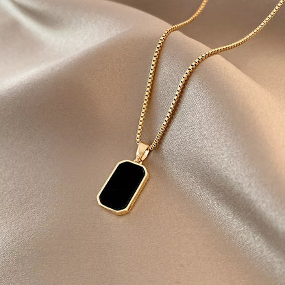 Rectangular pendant necklace in 18K gold with titanium steel chain