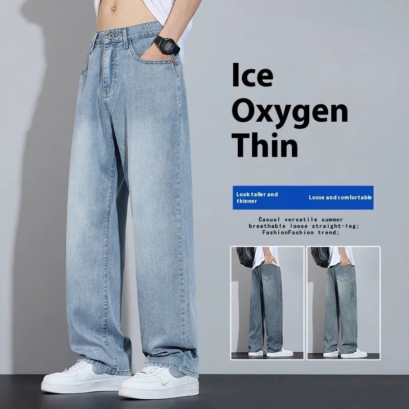 Straight-leg casual trousers in thin denim fabric with zip fly placket, available in UK2560 blue, grey, light blue, and vintage blue colours