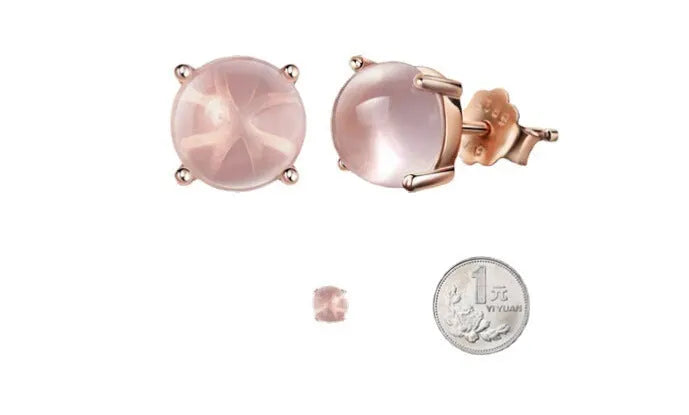 Women's drop-shaped stud earrings with synthetic rose quartz inlay and rose gold plating.