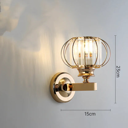 Crystal bedside lamp with stainless steel base and transparent shade providing soft illumination