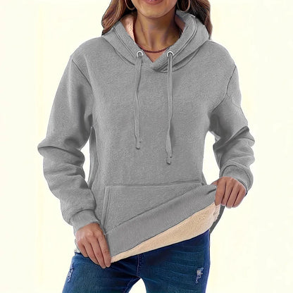 Women's loose fit hooded sweater in thick grey polyester fleece with 3D pattern and front pockets.