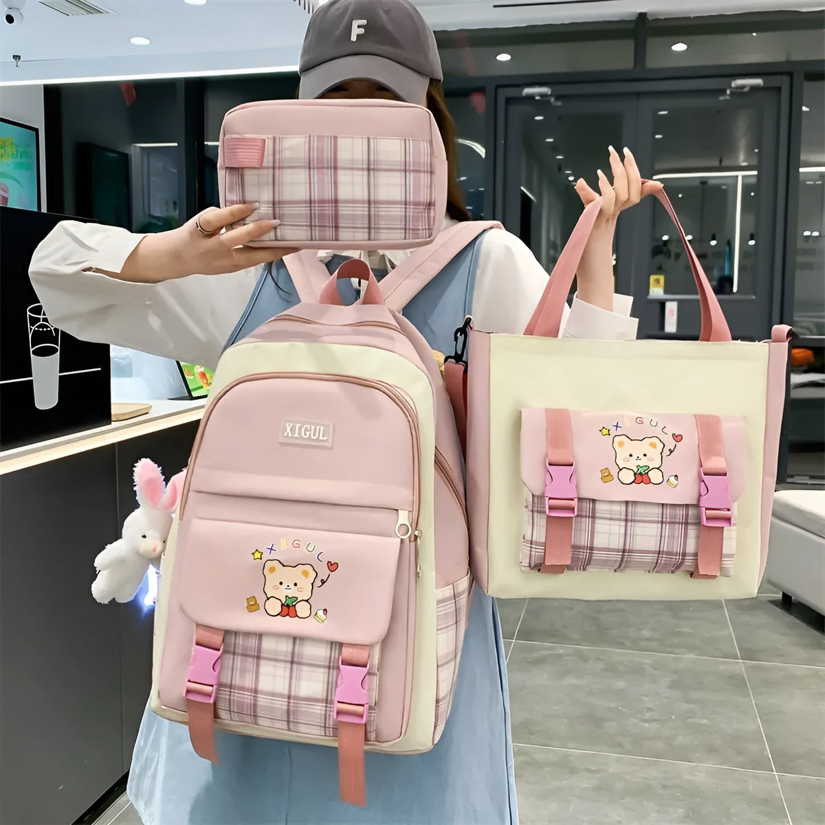 Large capacity plaid three-piece school backpack set in nylon with pink, blue, black, or purple colour options for junior high students