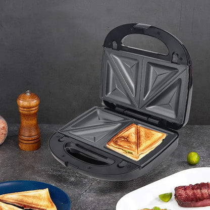 Black double-sided heating electric sandwich pan with brushed stainless steel top cover and non-stick coating.