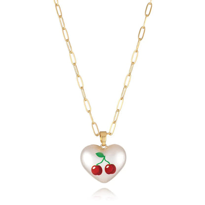 Geometric heart-shaped fruit pendant necklace on an adjustable metal chain