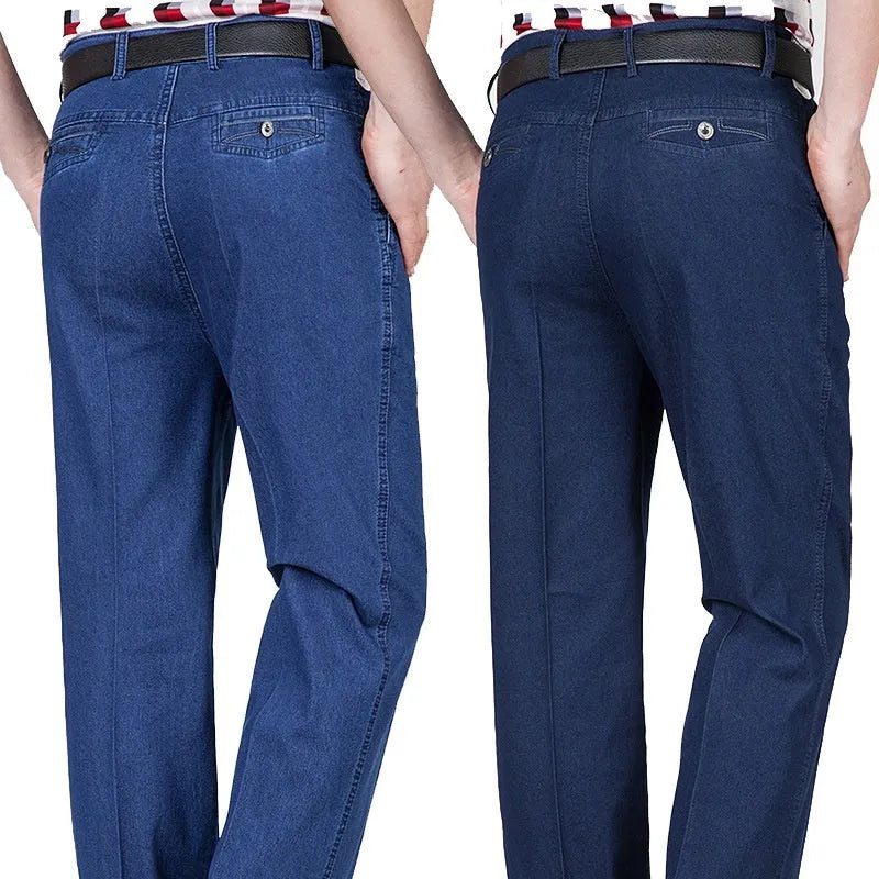 Men's high waist loose fit blue jeans on a hanger showing zip fly and casual style.