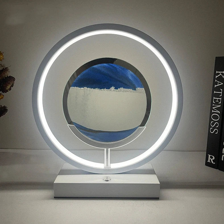 Creative minimalist quicksand table lamp with adjustable three-colour LED lighting on wooden surface