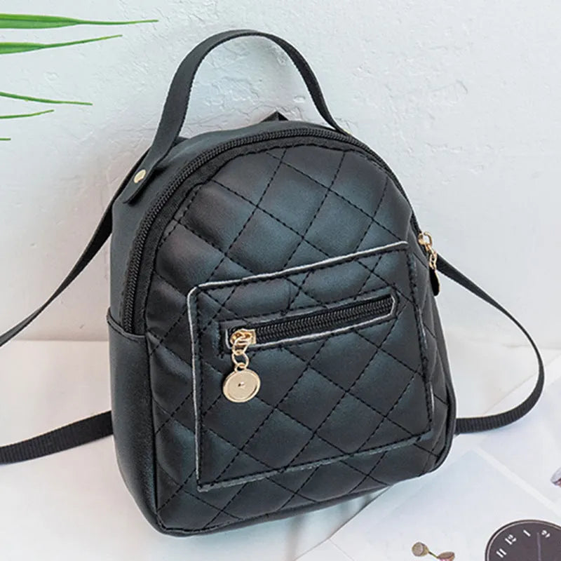 Girls' Korean style embroidered backpack in solid colour with hard PU construction and sandwich pocket