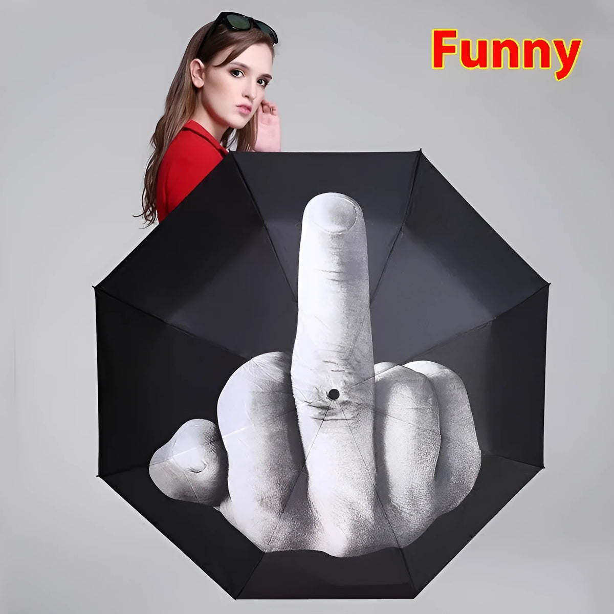 Folding umbrella showing tri-fold design with gesture motif and plastic handle
