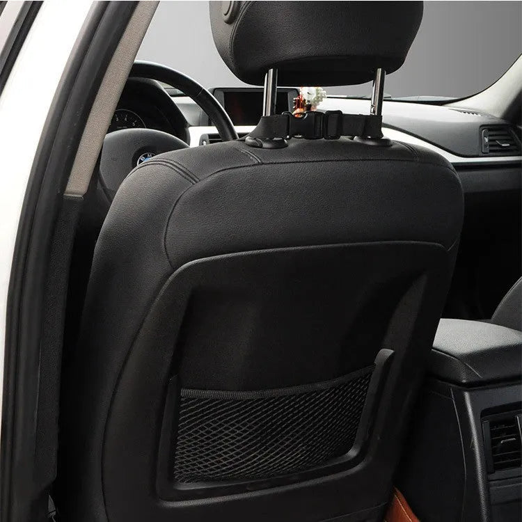 Memory cotton car lumbar support cushion in grey, showing its contoured shape on a car seat.