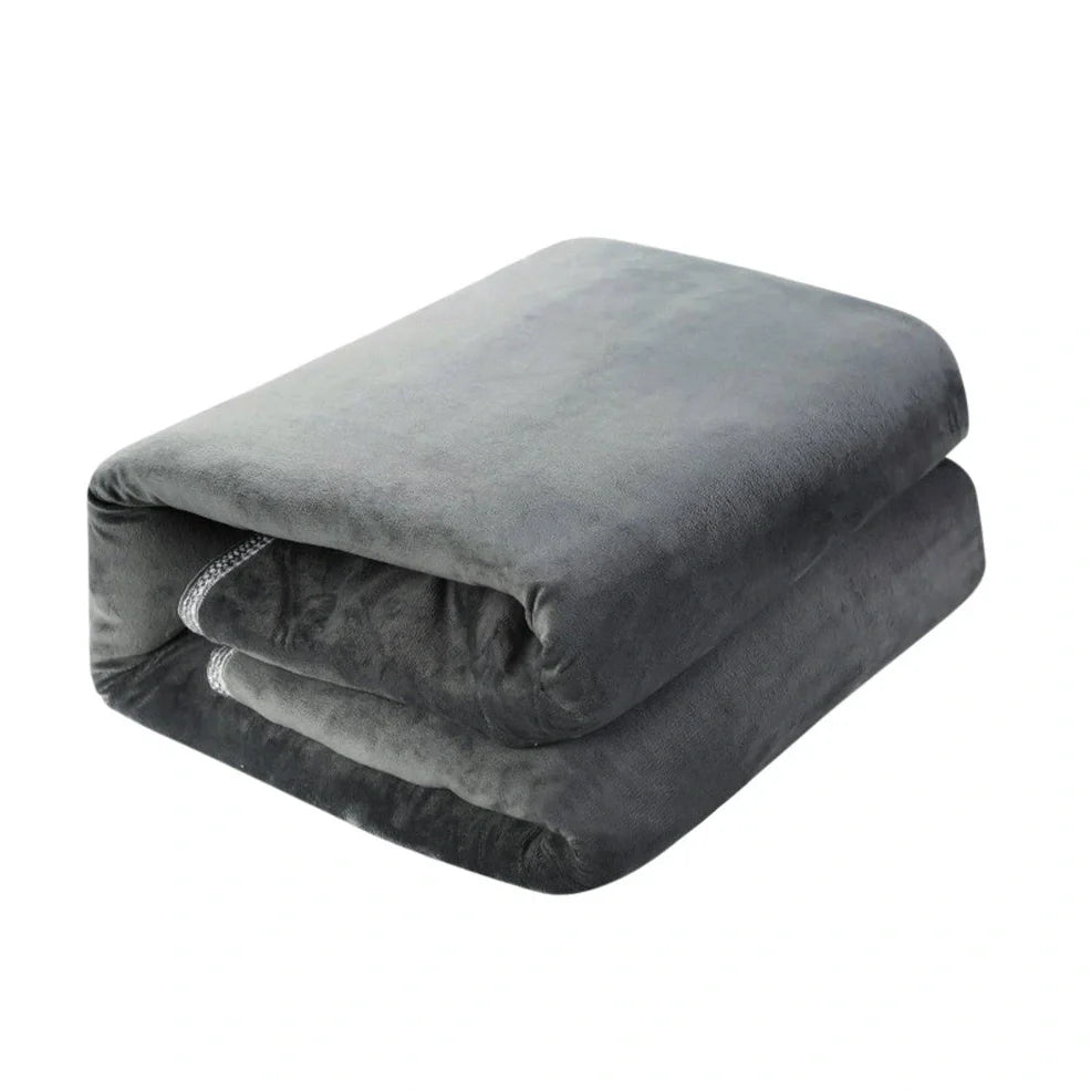 Grey tweed electric heating blanket showing 150cm width and UK plug compatibility