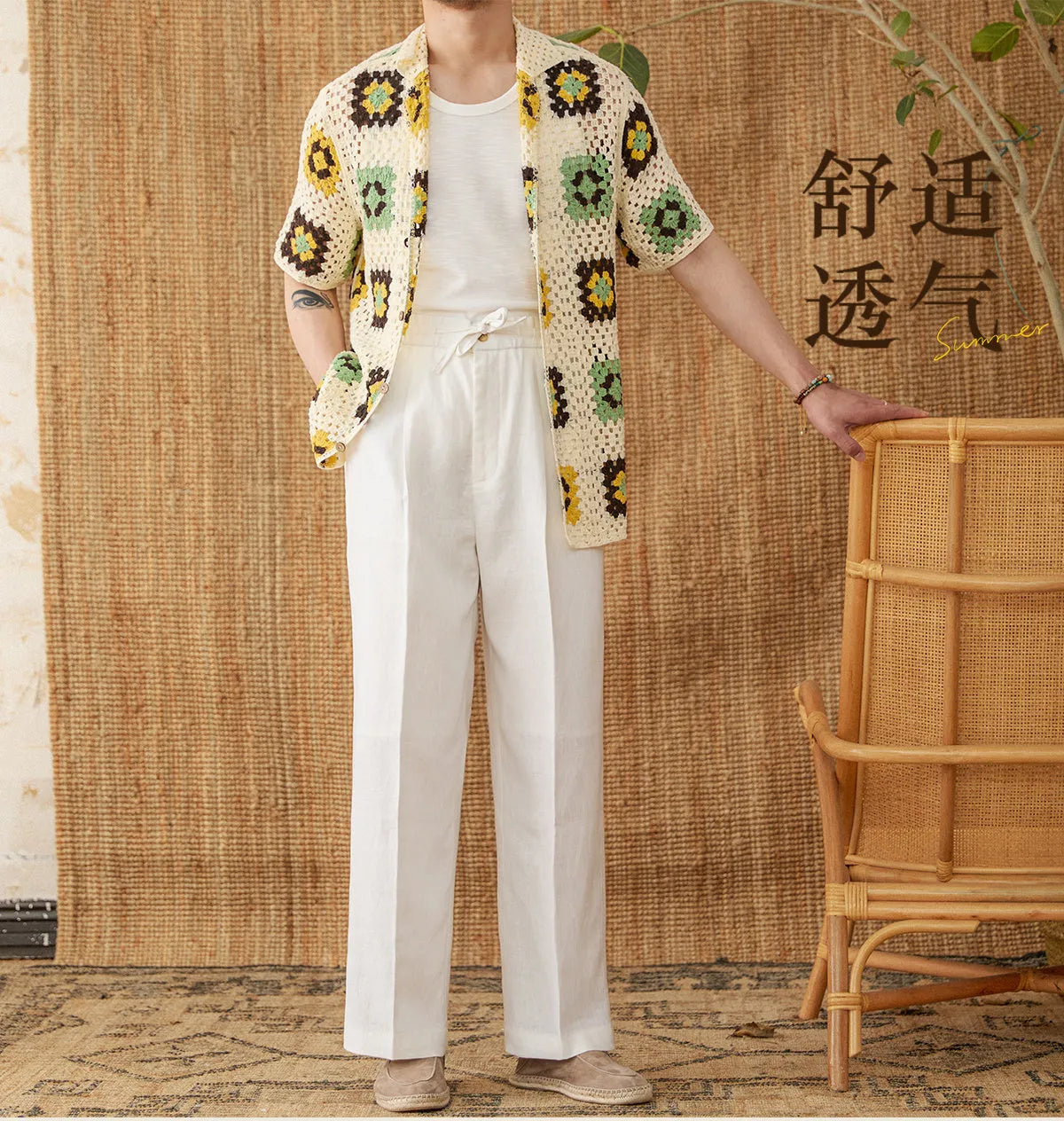 Linen high-waisted trousers with an elasticated waistband and loose straight-leg cut in greige colour
