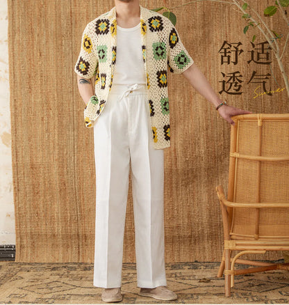 Linen high-waisted trousers with an elasticated waistband and loose straight-leg cut in greige colour