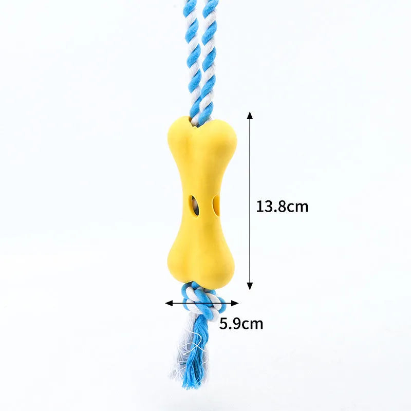 Green porous bone dog chew toy with rope knot texture for treat insertion and dental stimulation