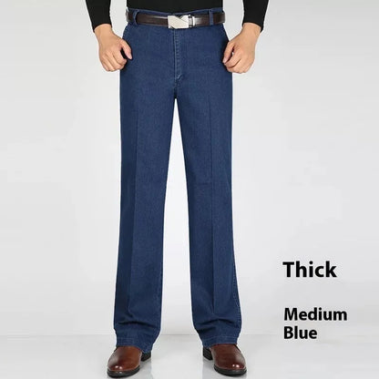 Men's high waist loose fit blue jeans on a hanger showing zip fly and casual style.