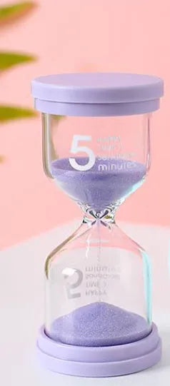 Glass sand timer with coloured quicksand in blue, green, pink, or purple options for 5-30 minute timing