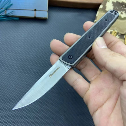 Folding fruit knife with 7cm stainless steel blade shown open and closed, available in black, red, or coffee colour finishes