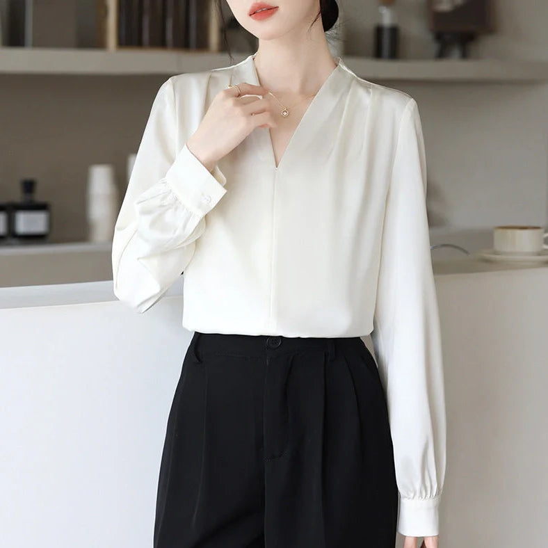 Women's blue long sleeve shirt with slim fit design and 3D stitching construction detail