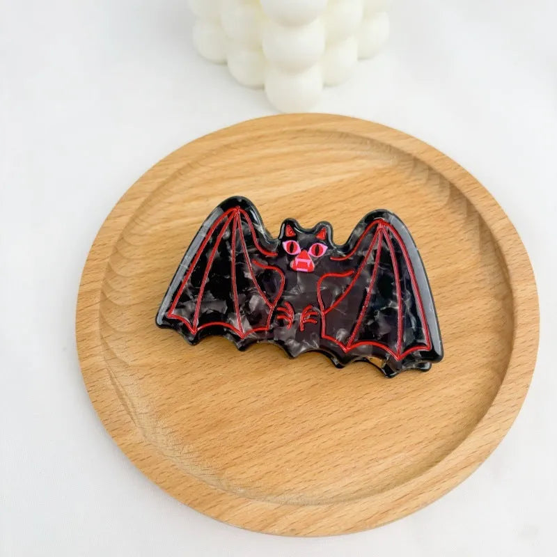 Halloween shark vinegar bat hair clip with acid-etched design in black