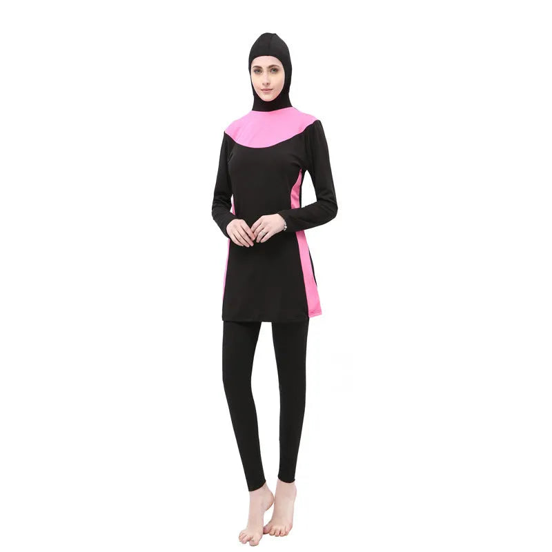 Conservative black women's swimsuit with long sleeves, a hood, and rose red panels.