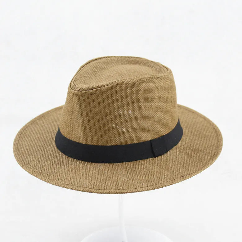 Men's wide brim flat top sun hat in beige colour with a paper fabric construction.