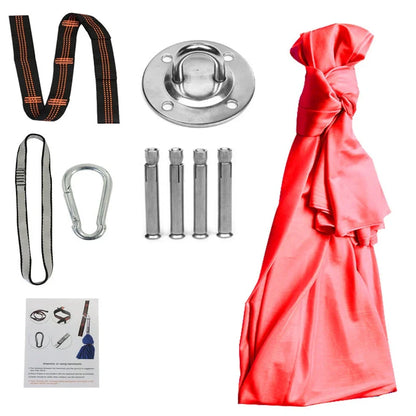 Child in black therapy swing cocoon with multi-loop daisy chain height adjustment system