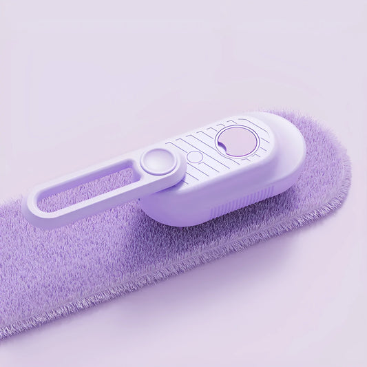 Dog grooming spray bottle and massaging comb kit on a white background.