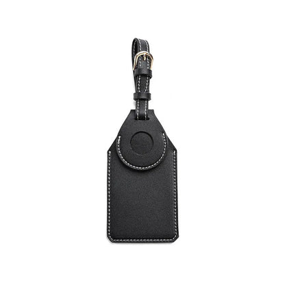 Luggage tag tracker protective cover in black, brown, and orange colours made from PU/PVC material.