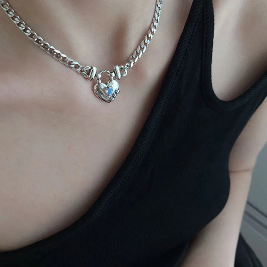 Heart Sweater Necklace with geometric design and Thai silver plated finish