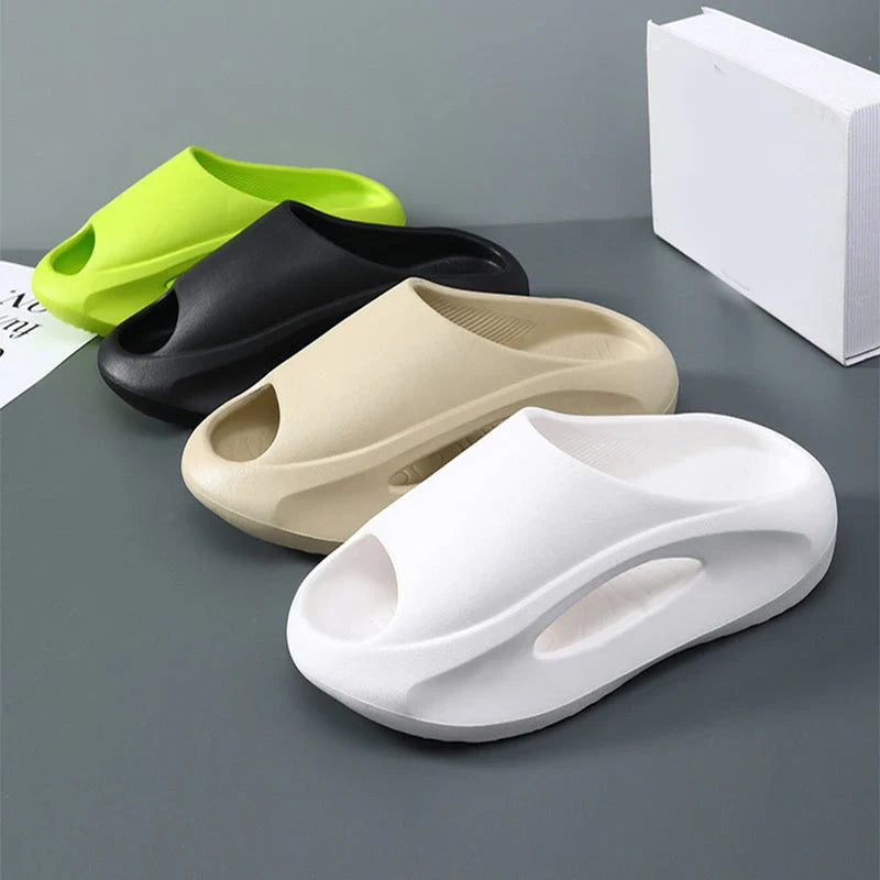 Stylish and comfortable unisex slippers with a unique hollow design, perfect for summer beach and casual wear