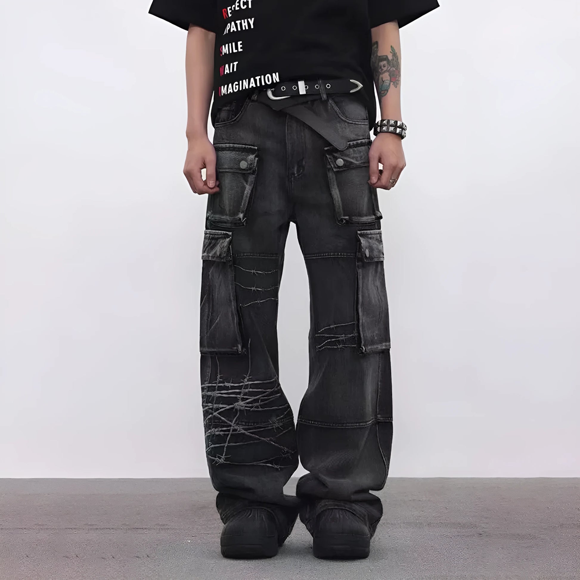 Men's black wide-leg cotton trousers with embroidery details on mid waist design